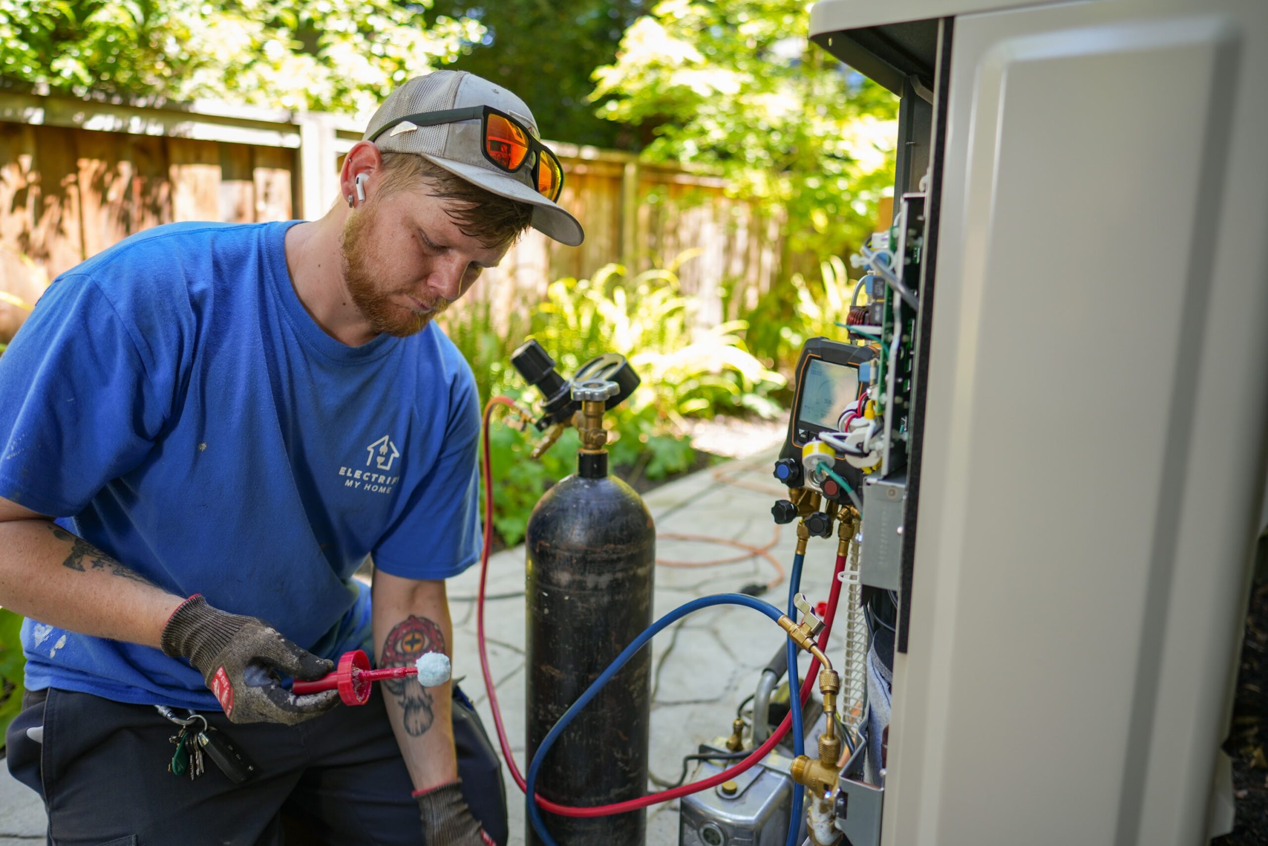 Person installing a heat pump