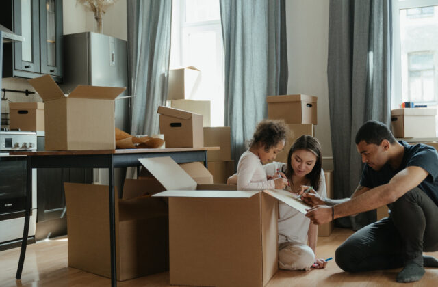 Family With Boxes By Canva (1)