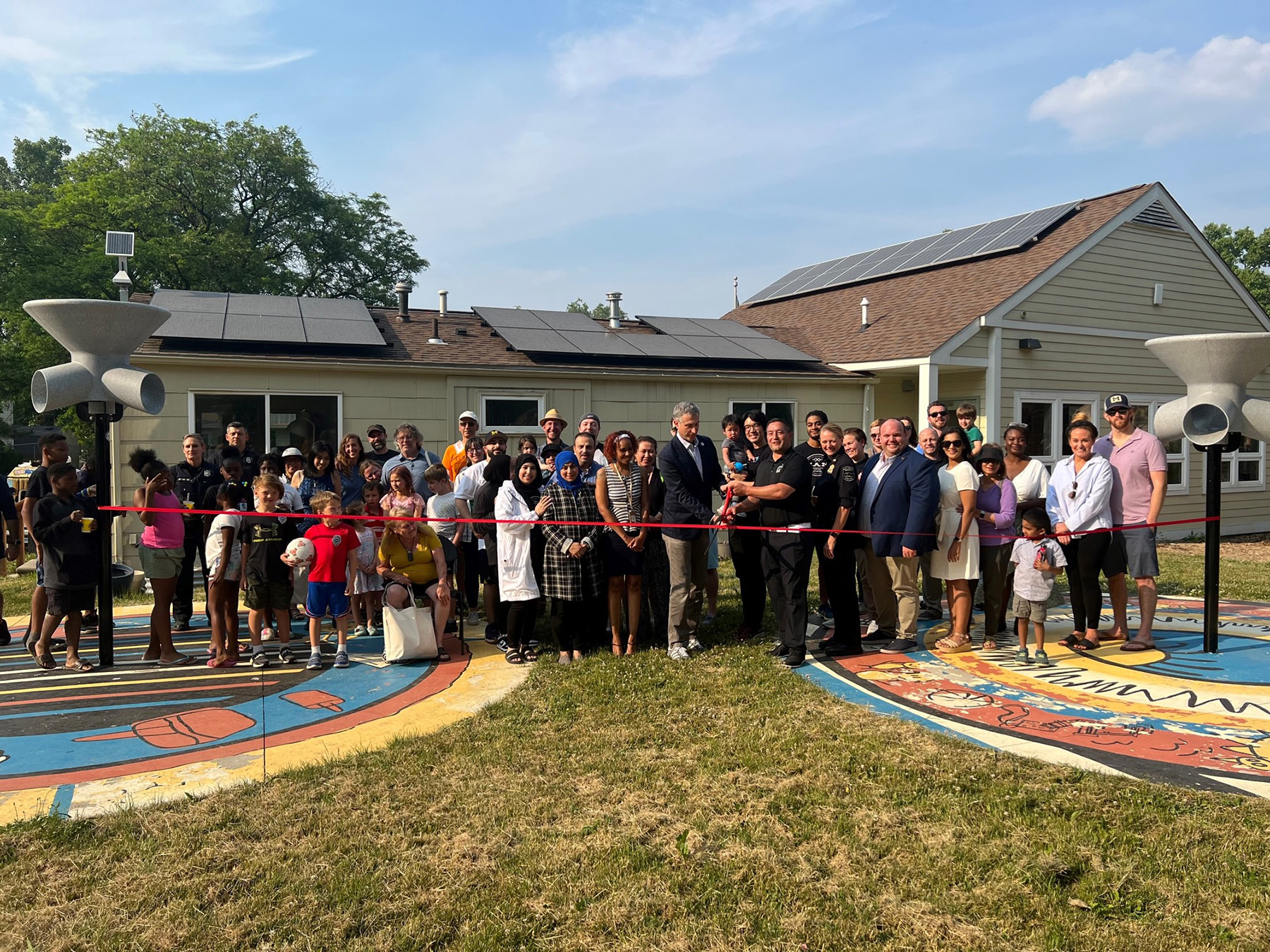 Ribbon Being Cut At Resilience Hub